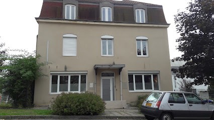 Muizzo Christel, Dentiste à Unieux